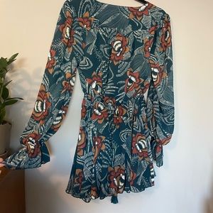 Peacock print romper. NWT